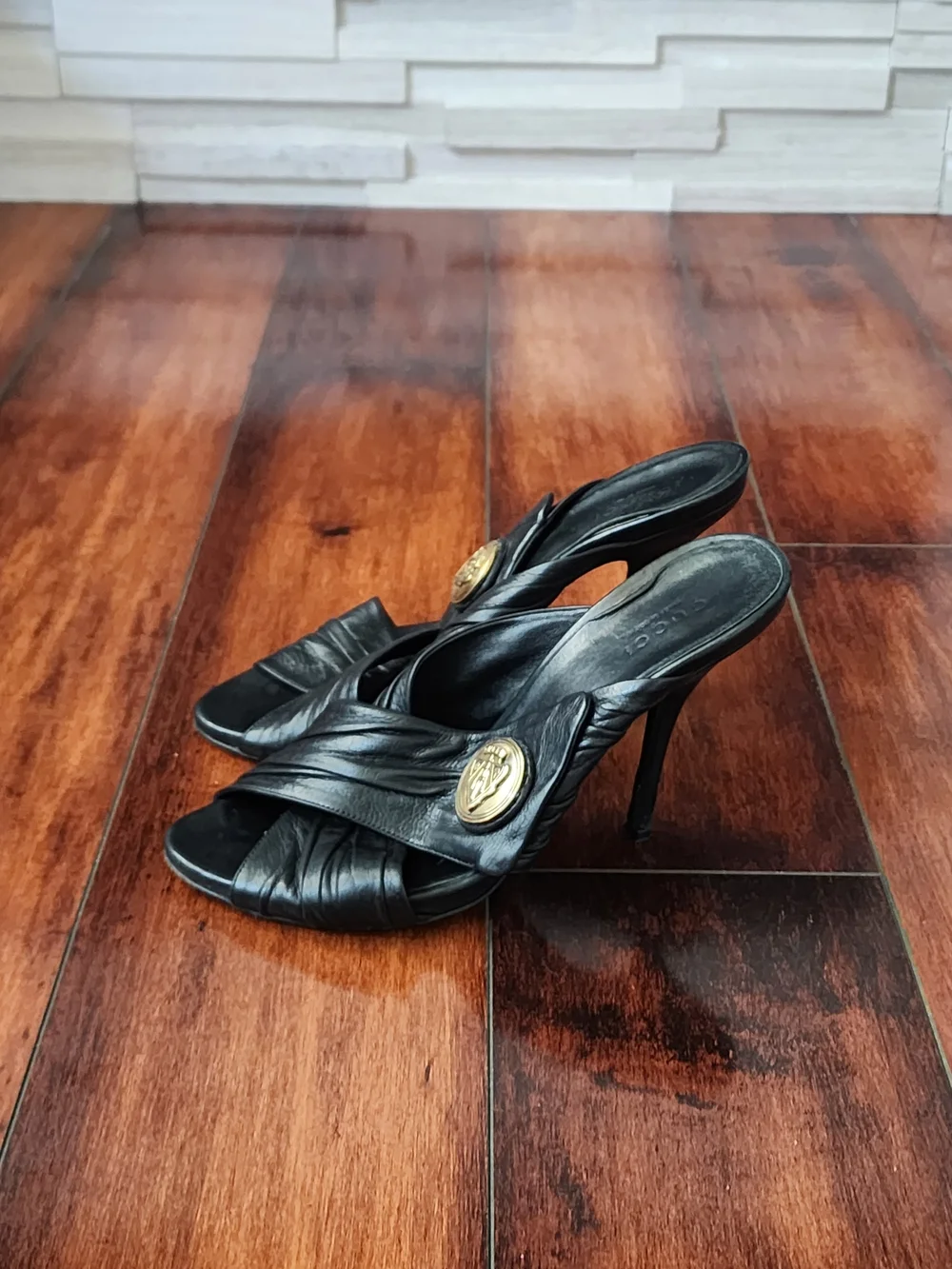 Gucci Black Leather High Heel Slide with Gold Medallion